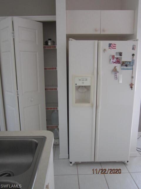 PANTRY AND REFRIGERATOR.