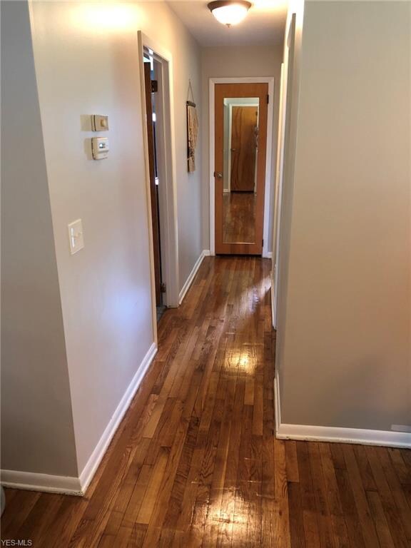 Hallway going to master bedroom, bathroom, and sec