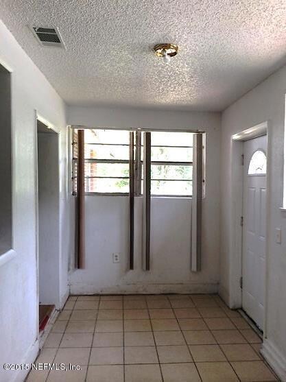 ENCLOSED FRONT PORCH
