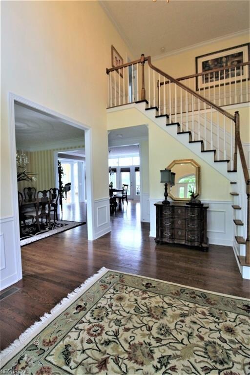 Soaring Two-Story Foyer with Split Staircase