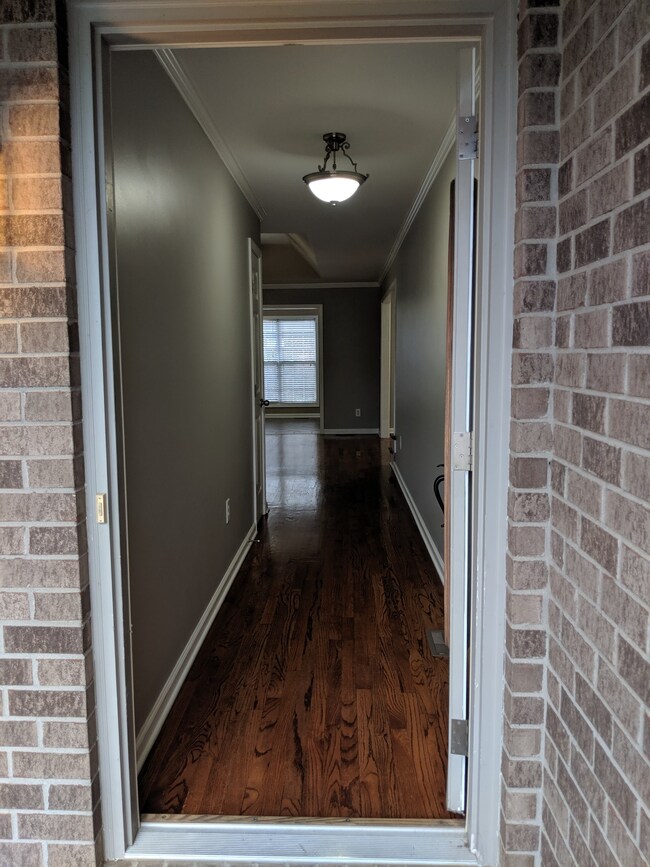 Welcome home! Freshly painted home with flowing floorplan and tray ceilings.