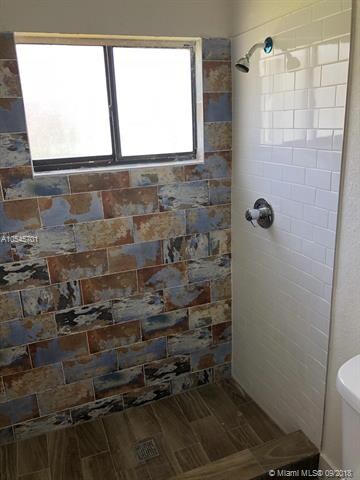 Designer style modernized shower.