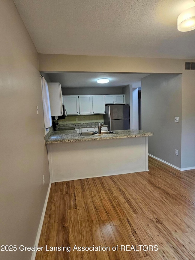 3740 Cavalier Dr unit 2, Okemos, MI 48864 - photo 4