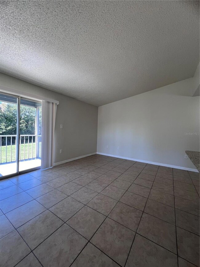 3834 Bay Club Cir unit 203, Kissimmee, FL 34741 - photo 4