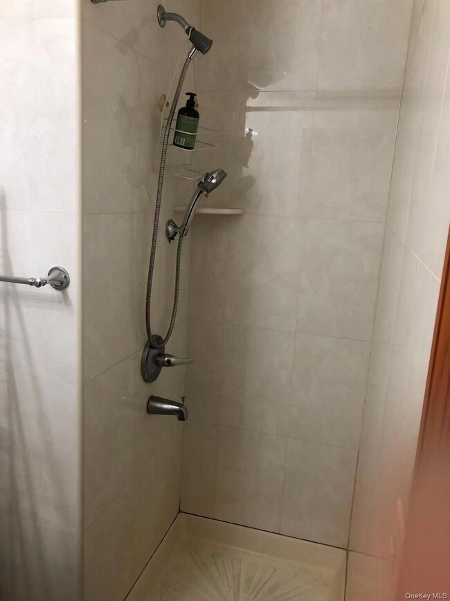 Bathroom with a stall shower