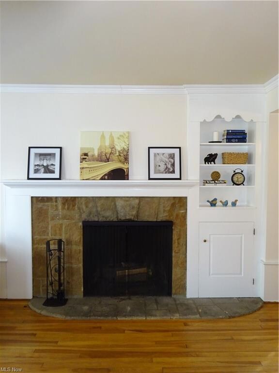 Charming fireplace surrounded with stone and built