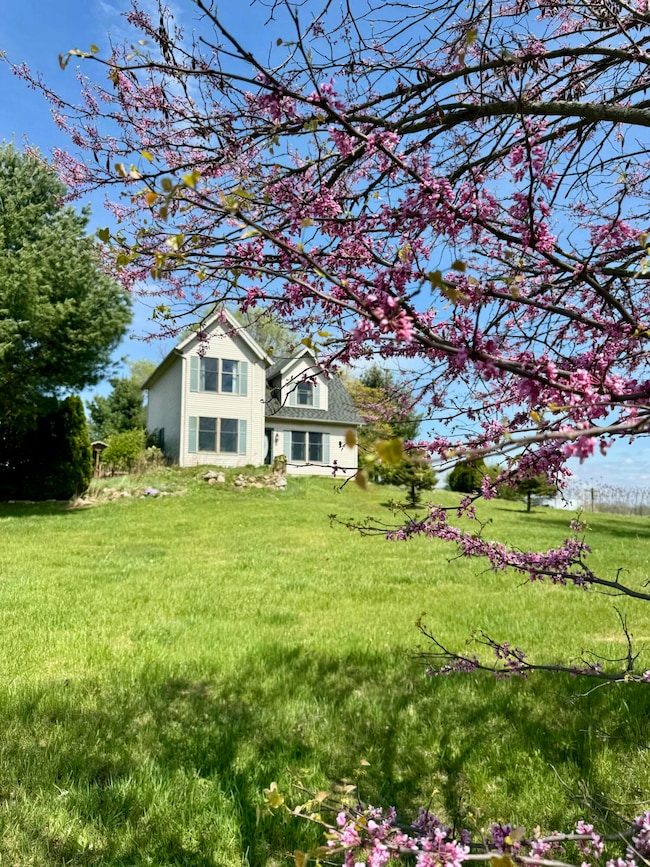 Front of home and Pond