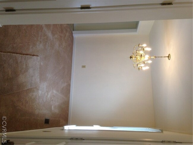 Formal dining or FLEX room has brand NEW CARPET,