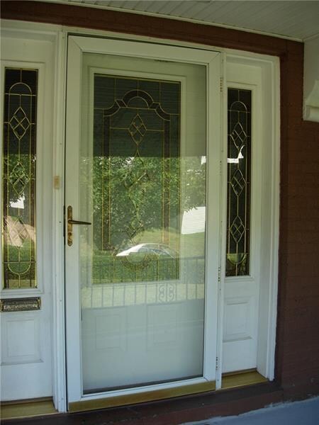 Front door with side lights let in an abundance of
