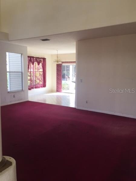 GREAT ROOM WITH CATHEDRAL CEILINGS OPENS TO DINING
