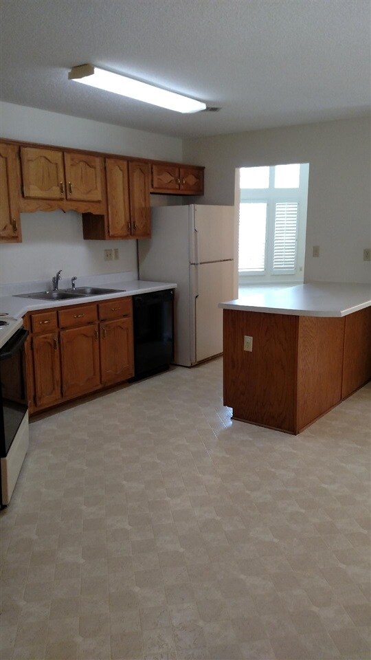 16'X15' kitchen features double SS sink, pantry, a