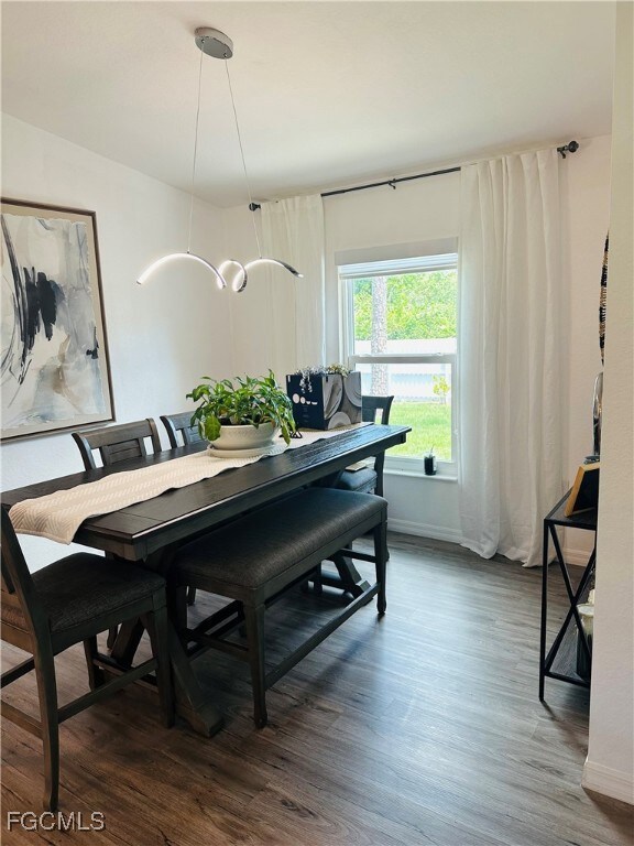 Dining area with wood finished floors