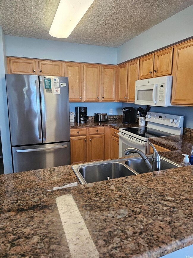 Kitchen with Granite Counter Tops