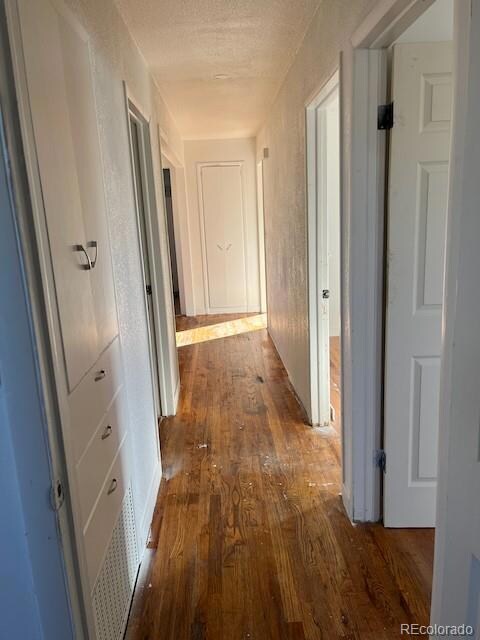 3 main floor bedrooms located down the hall from the dining room