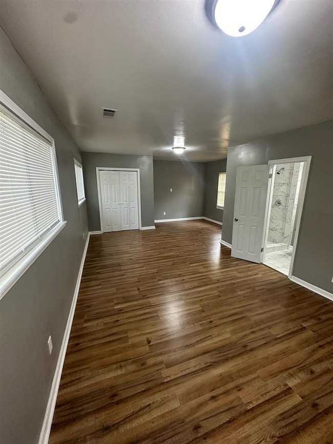 Entrance foyer with dark wood-type flooring