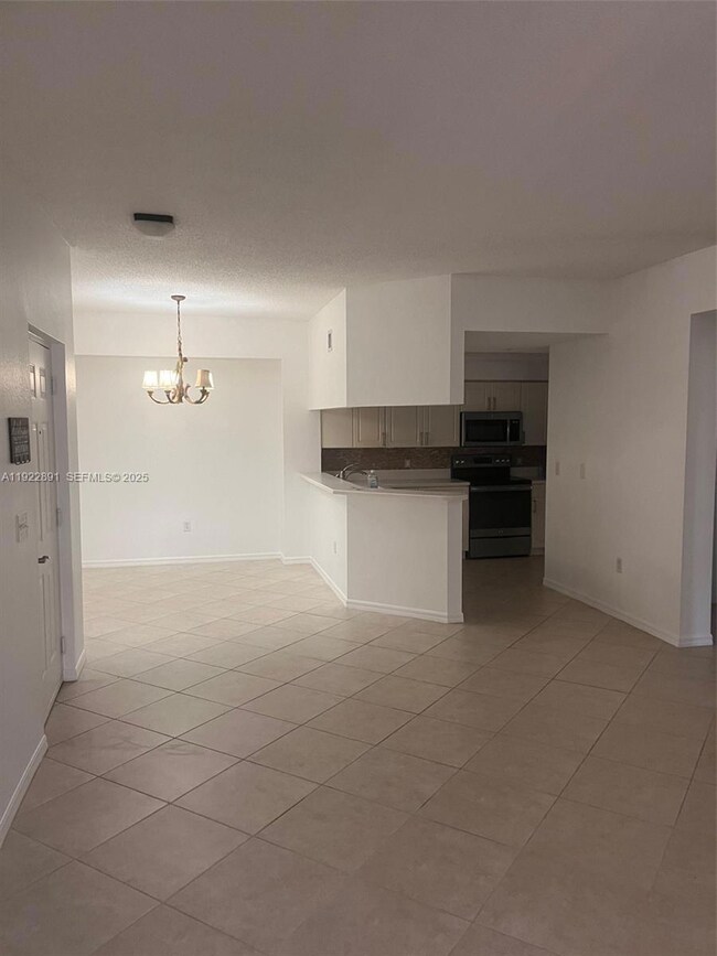3021 Alcazar Place unit 203, Palm Beach Gardens, FL 33410 - photo 4