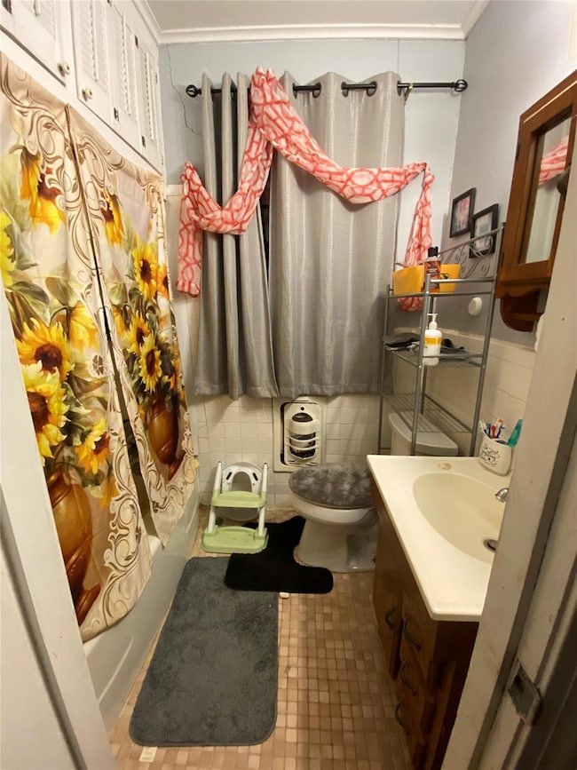 Full bathroom with shower / bath combination with 