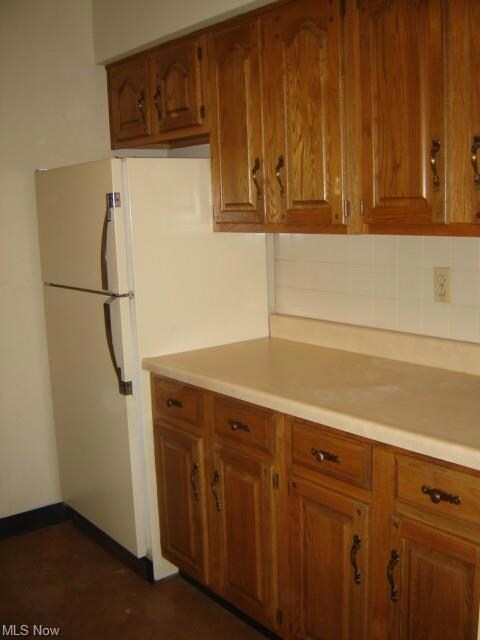 Efficient kitchen enjoys ample counter and cabinet