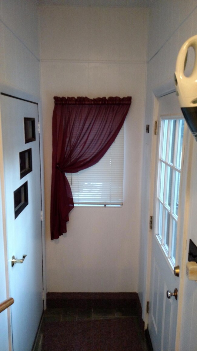 Side Entrance to Garage, Kitchen & LL