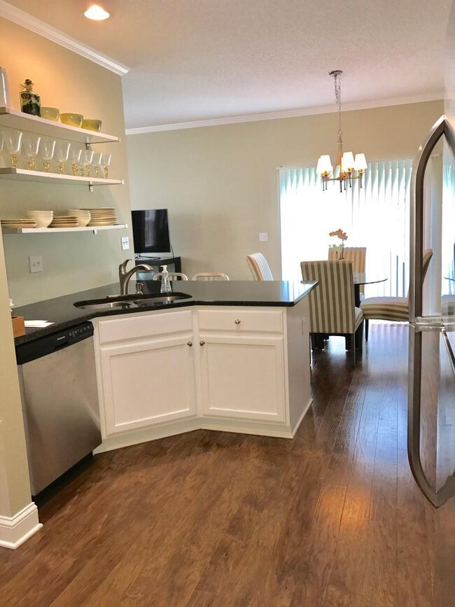 Remodeled Kitchen with hard surface counter tops.
