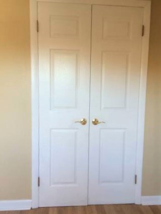 Painted White trim and doors.   MBR Closet.