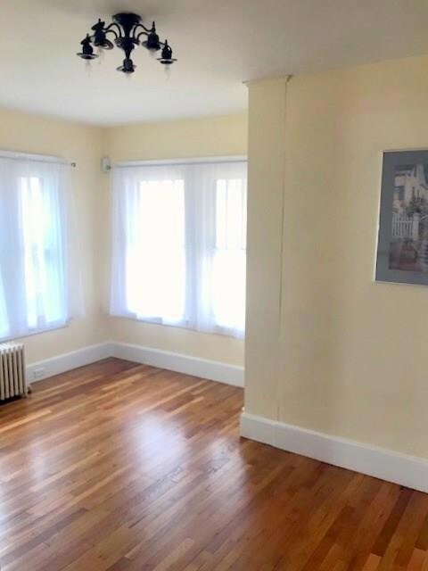 Dining room also has wood floors...