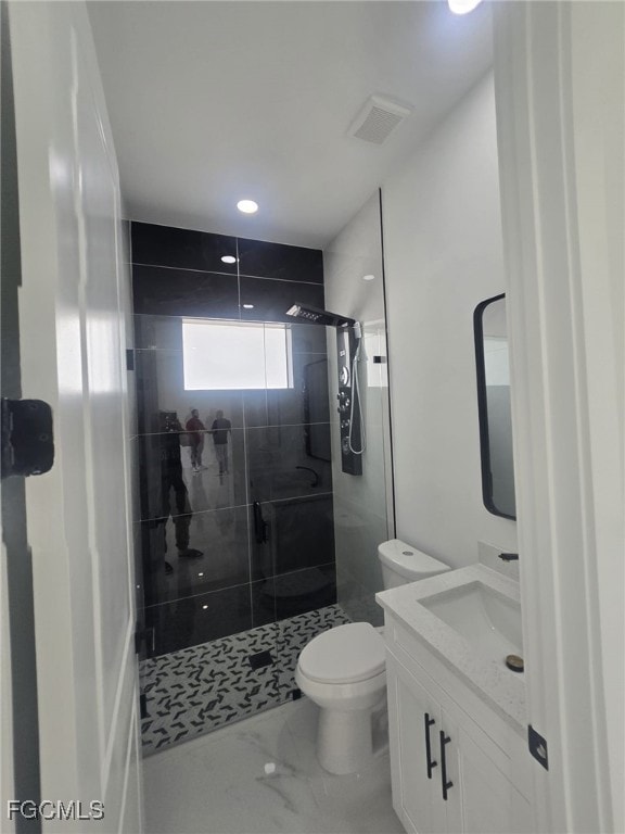 Full bath with a stall shower, marble finish floor