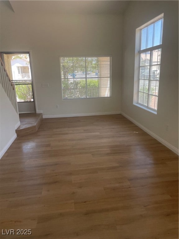 Unfurnished living room with plenty of natural lig