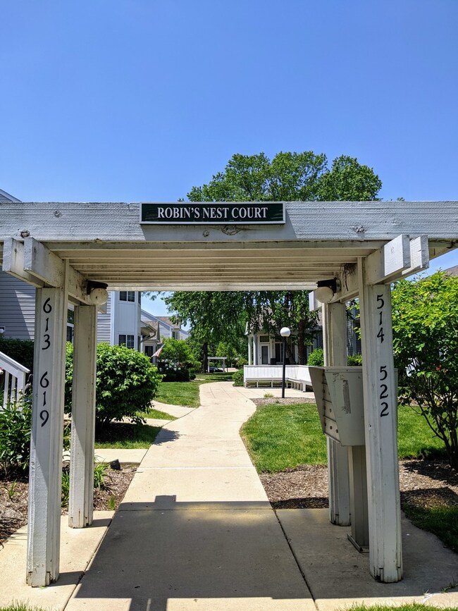 An arbor welcomes you into the courtyard entrance 