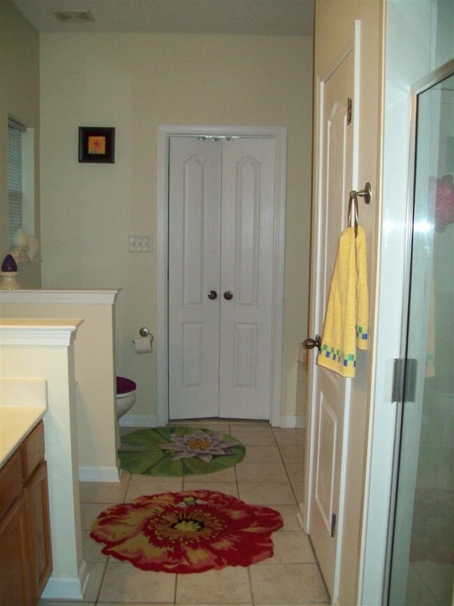 Master bath, which consists of a separate shower, 