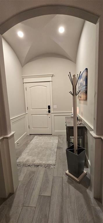 Foyer entry w/arched ceiling, slate colored tile.