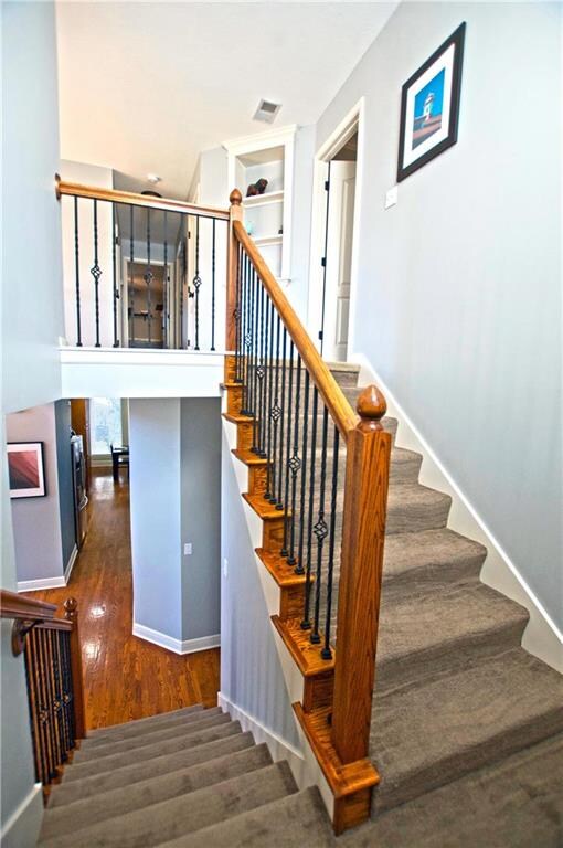 Iron spindles and new carpet on stairs