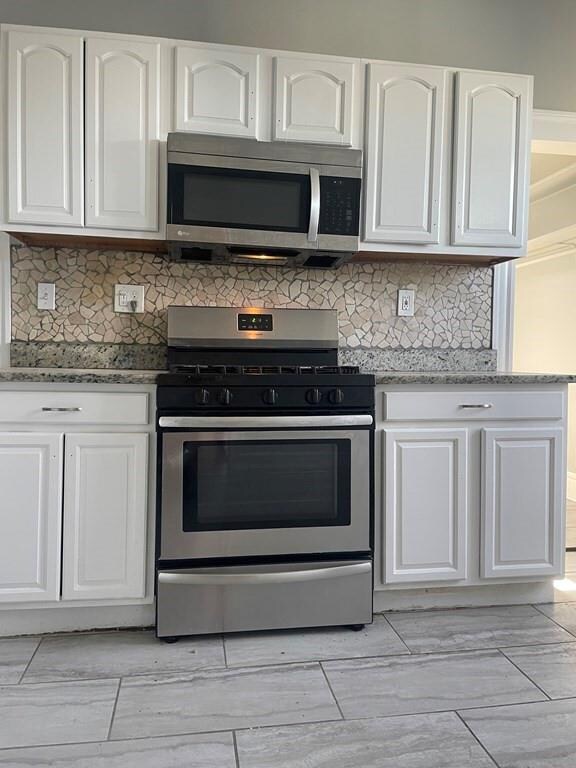 31 Woolson St unit 3, Mattapan, MA 02126 - photo 2