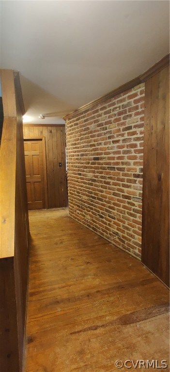 Fabulous exposed brick accent wall welcomes guests