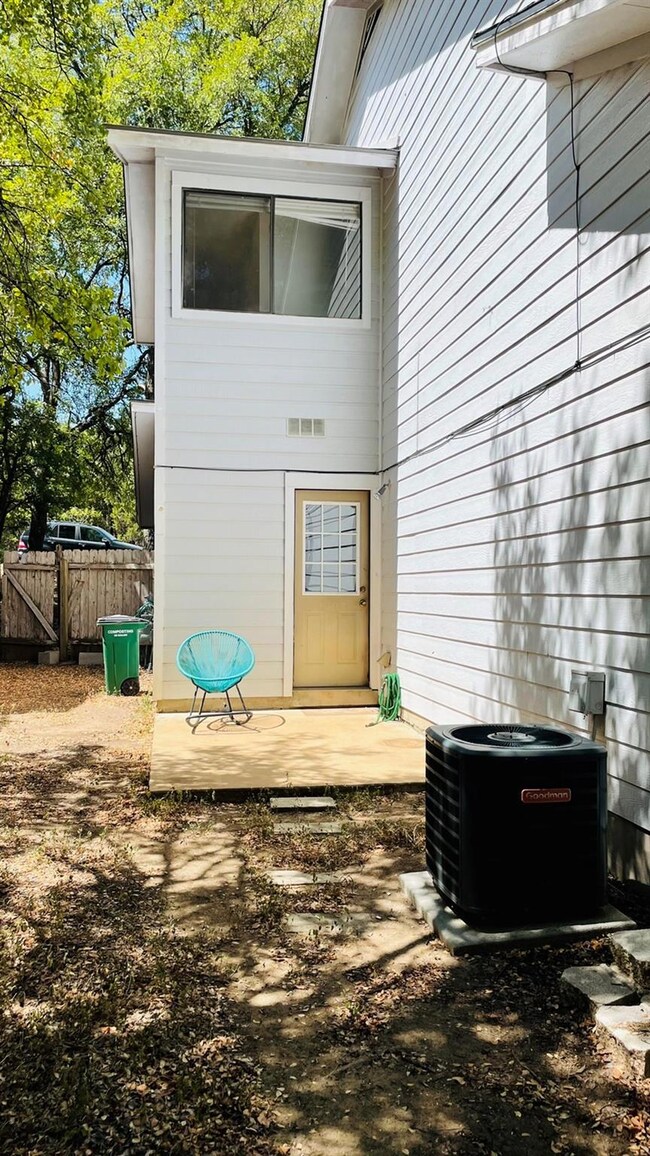 Doorway to property with central AC