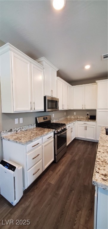Kitchen with appliances with stainless steel finis