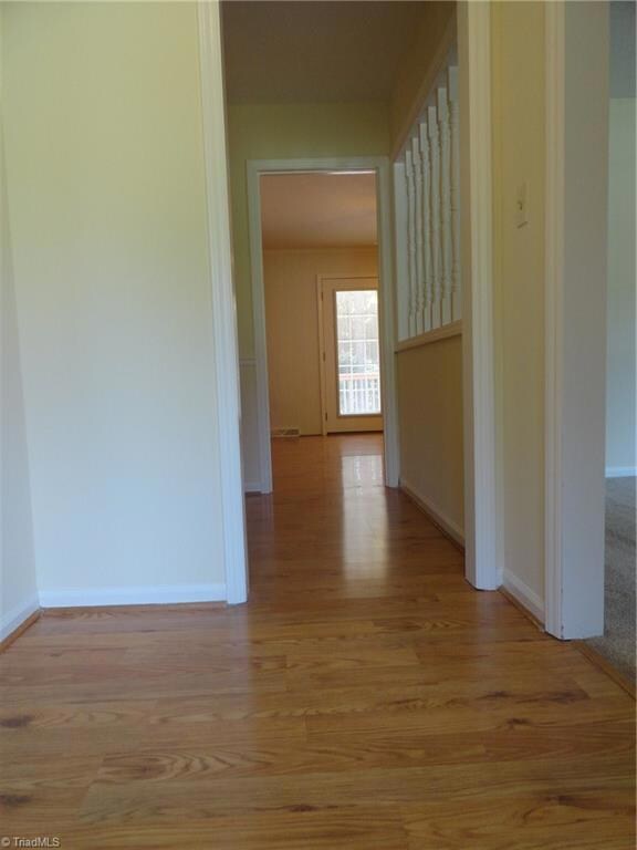Updated floors thru entry, hallway, den/dining area