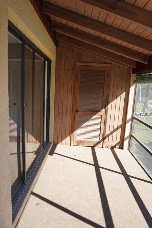 Screened lanai area off master bedroom awaiting a 