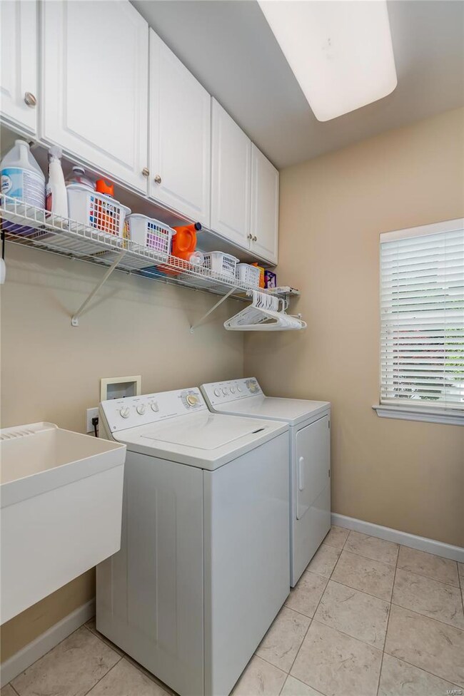 Laundry is a breeze on the main floor. Natural lig
