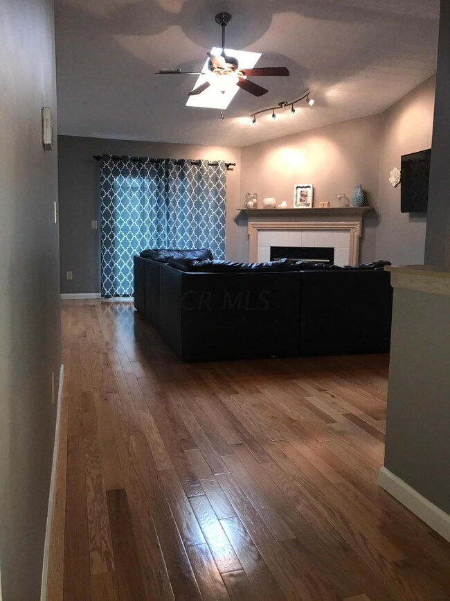 Entry with hardwood floors/great rm