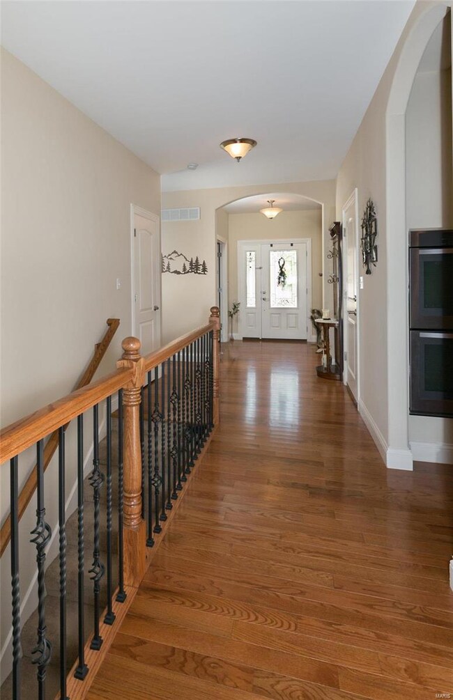 Another view with Wood and spindle banister.