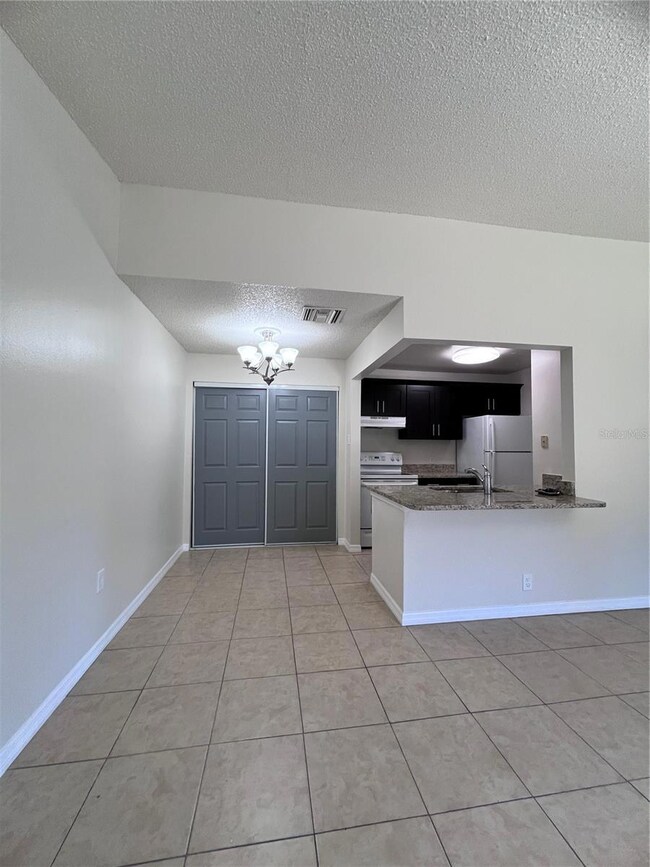 3834 Bay Club Cir unit 203, Kissimmee, FL 34741 - photo 5