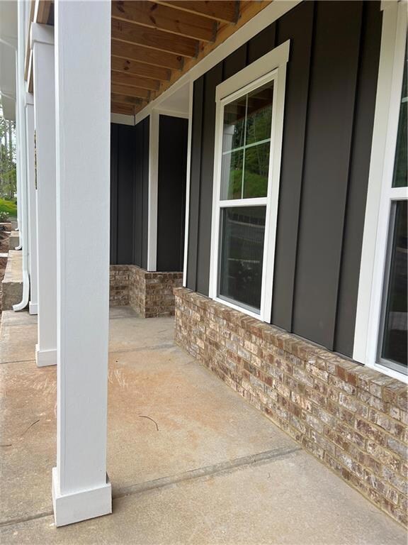 Covered Front Porch large enough for 2 Rocking Chairs!!