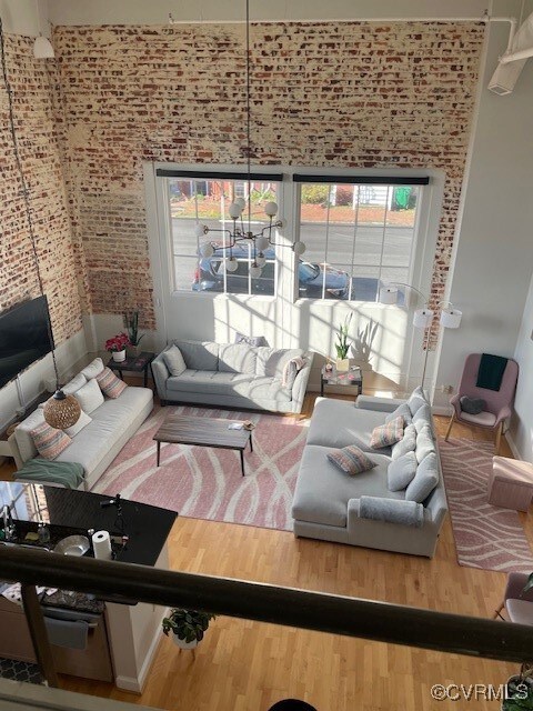Living room with hardwood / wood-style flooring, b