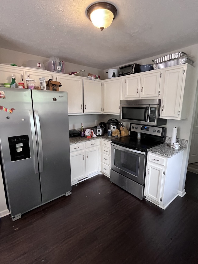 Kitchen with stainless steel appliances.