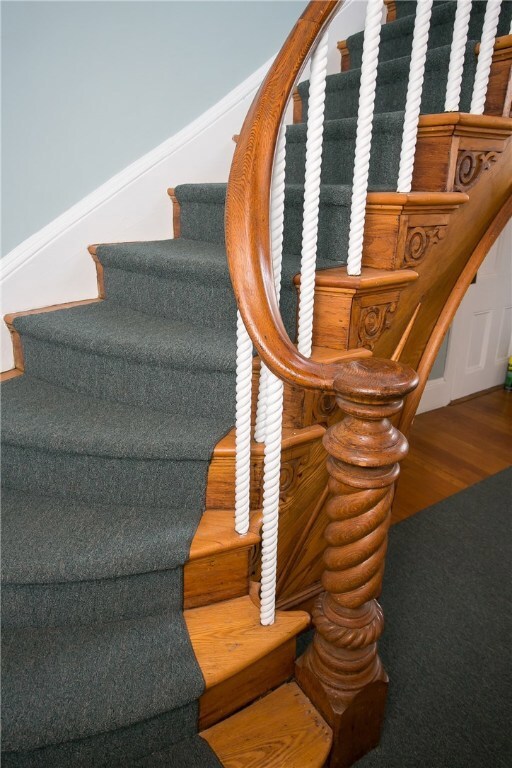 Up the stairs to unit 5. Beautiful wood carved ban