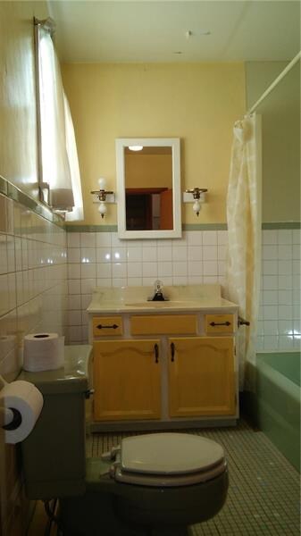 Main Floor Full Bath With Ceramic Flooring