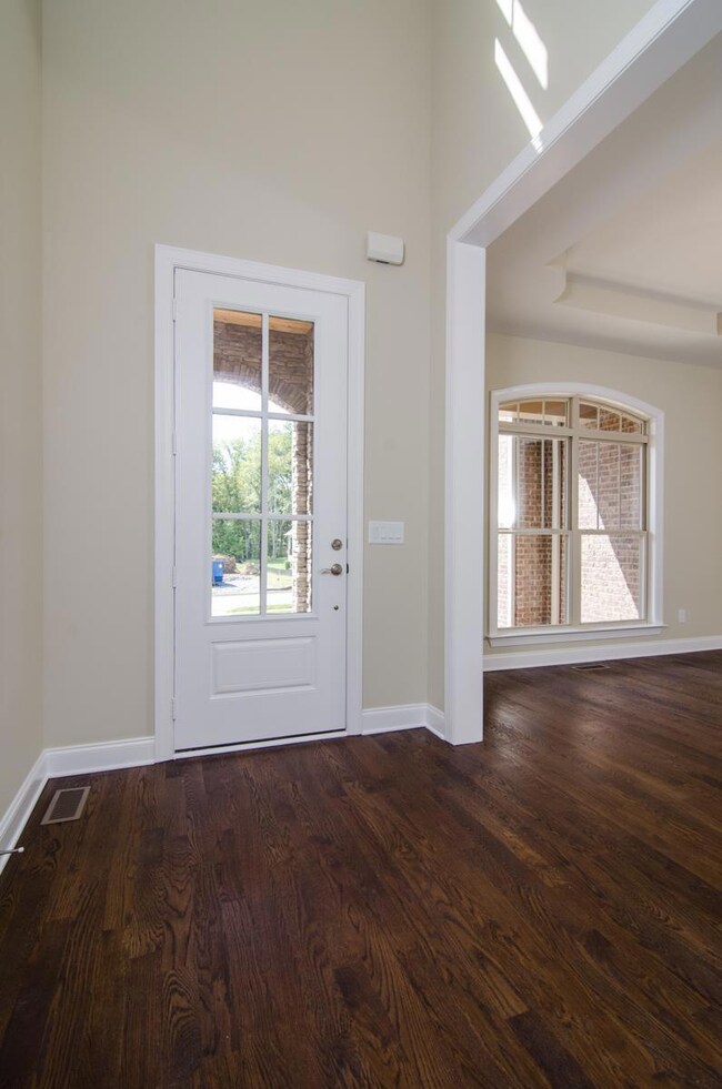 Welcoming foyer with an 18 foot ceiling creates a dramatic entrance! 
