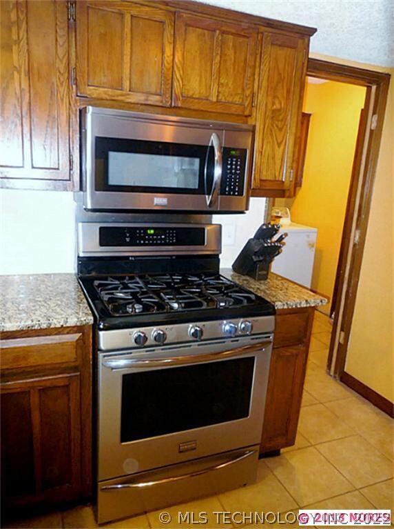 Closer view of the stove.  The door to the right o