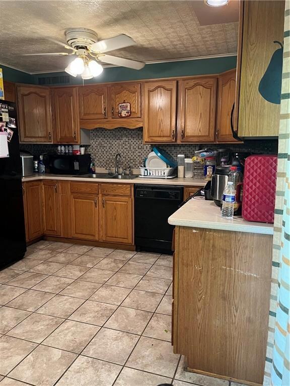 Equipped kitchen accesses rear yard & patio